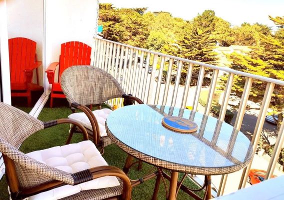 Beautiful terrace with ocean view and greenery